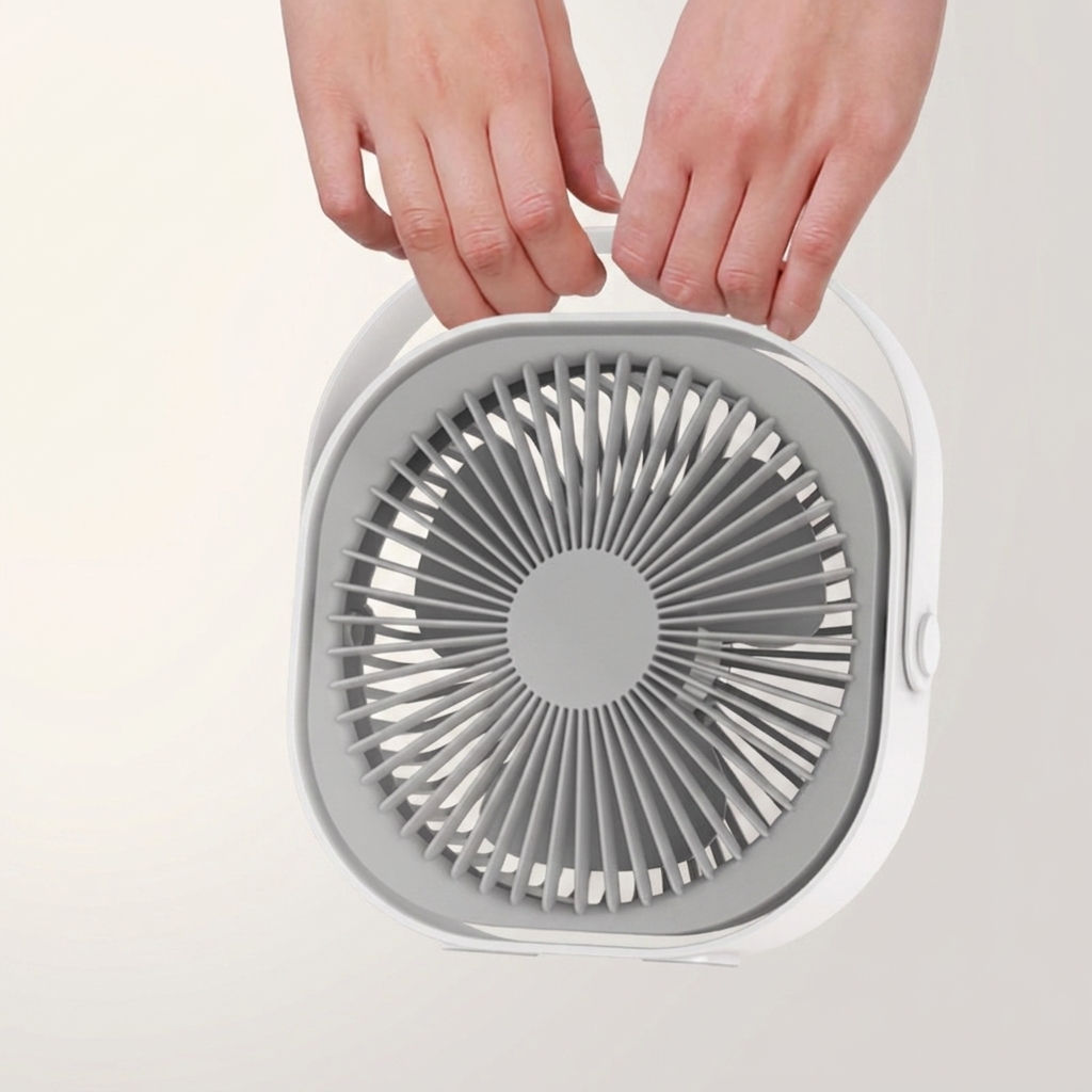 360 degree rechargeable portable desk fan on a desk