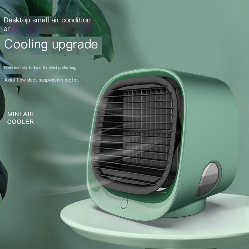 Compact green bladeless water-cooled fan with a black grille, circulating cool air on a white surface.