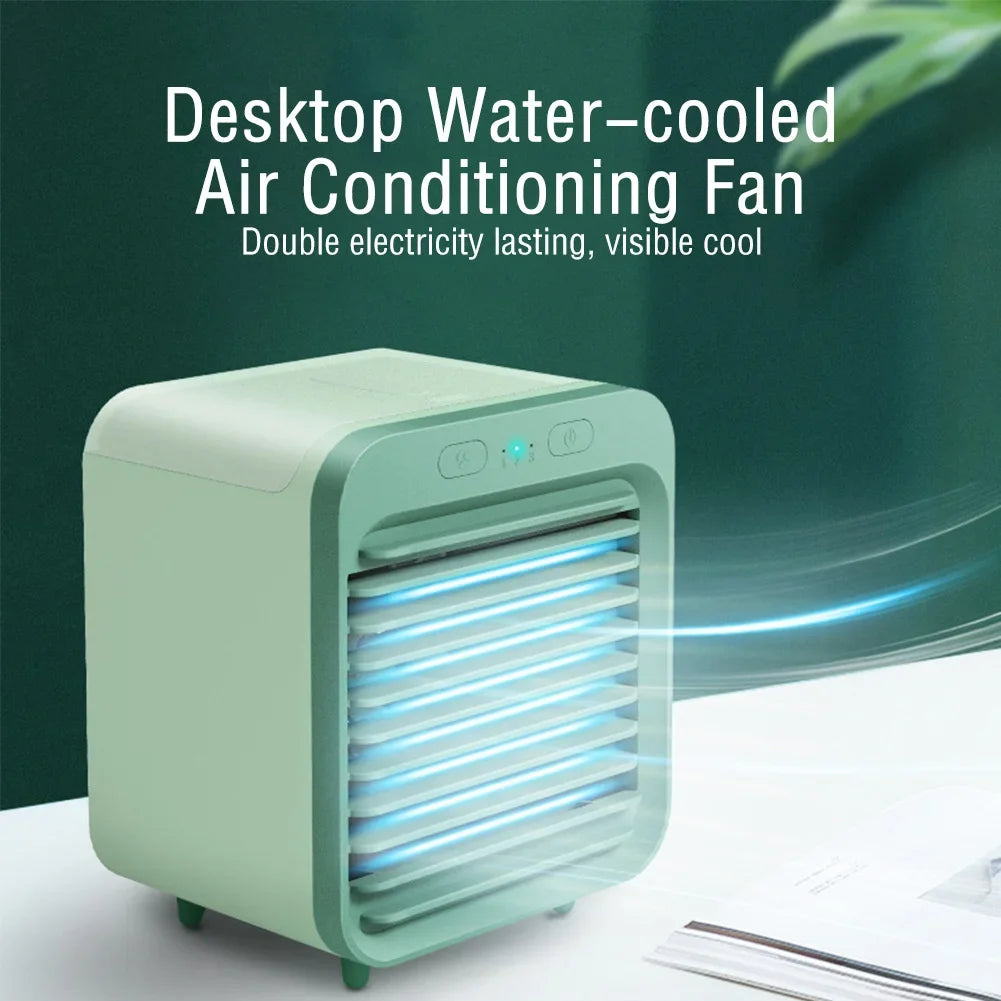 Compact green rechargeable mini air cooler and humidifier with blue mist, ideal for desktop use.