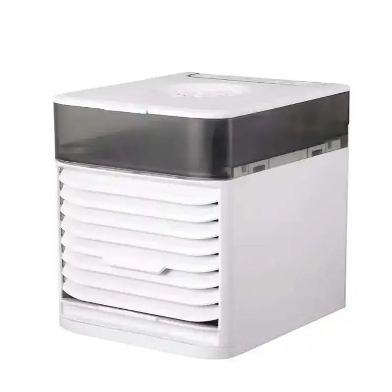 Compact white mini water-cooled spray desk fan with a dark gray top and front louvered vents.
