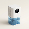 White mini dehumidifier with colour-changing light