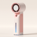 Pink handheld misting fan with water tank
