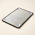 Blackout window insulation panel with aluminium foil facing and corner suction cups